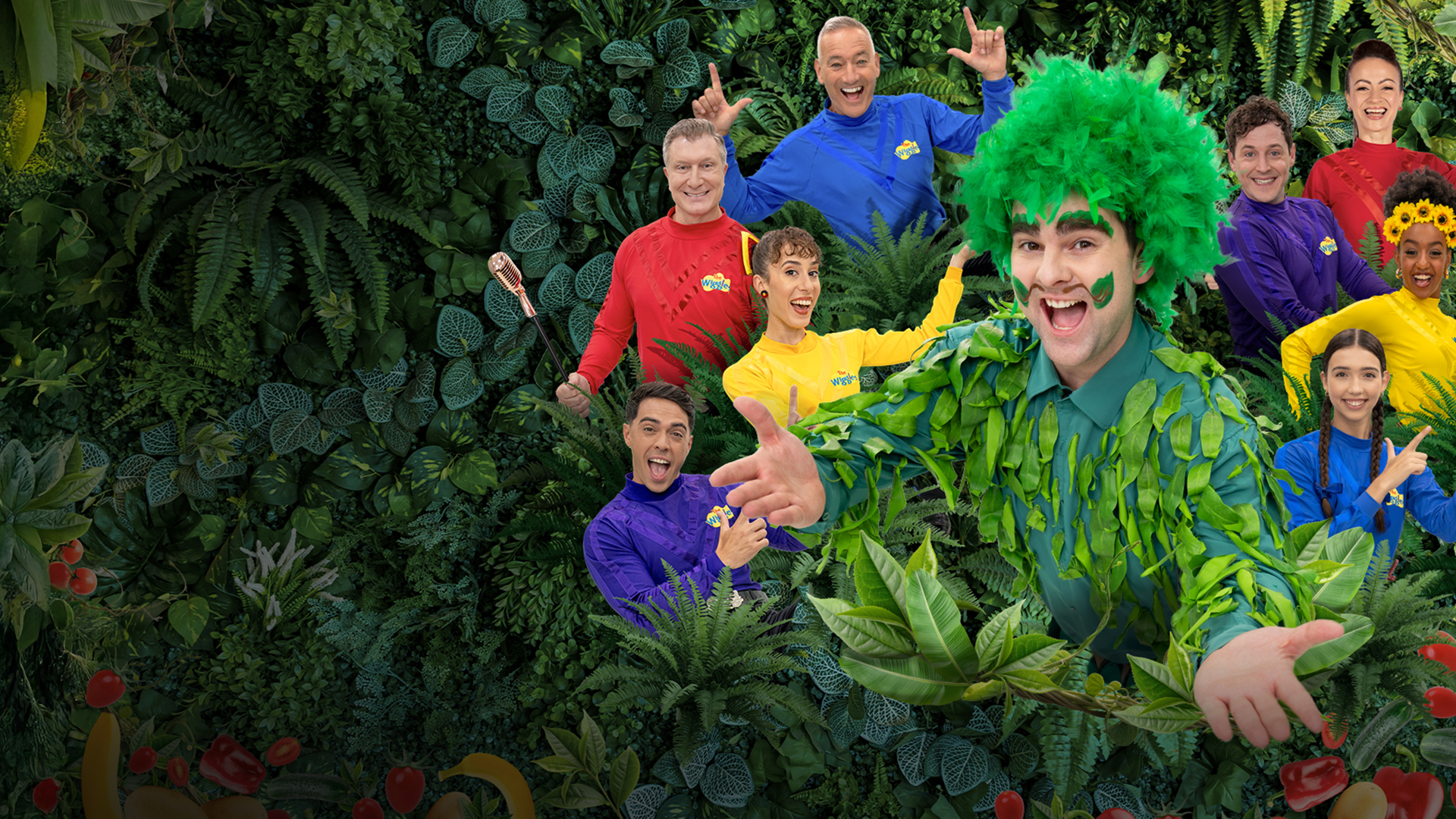 The Wiggles and the Tree of Wisdom, surrounded by colourful decorations.