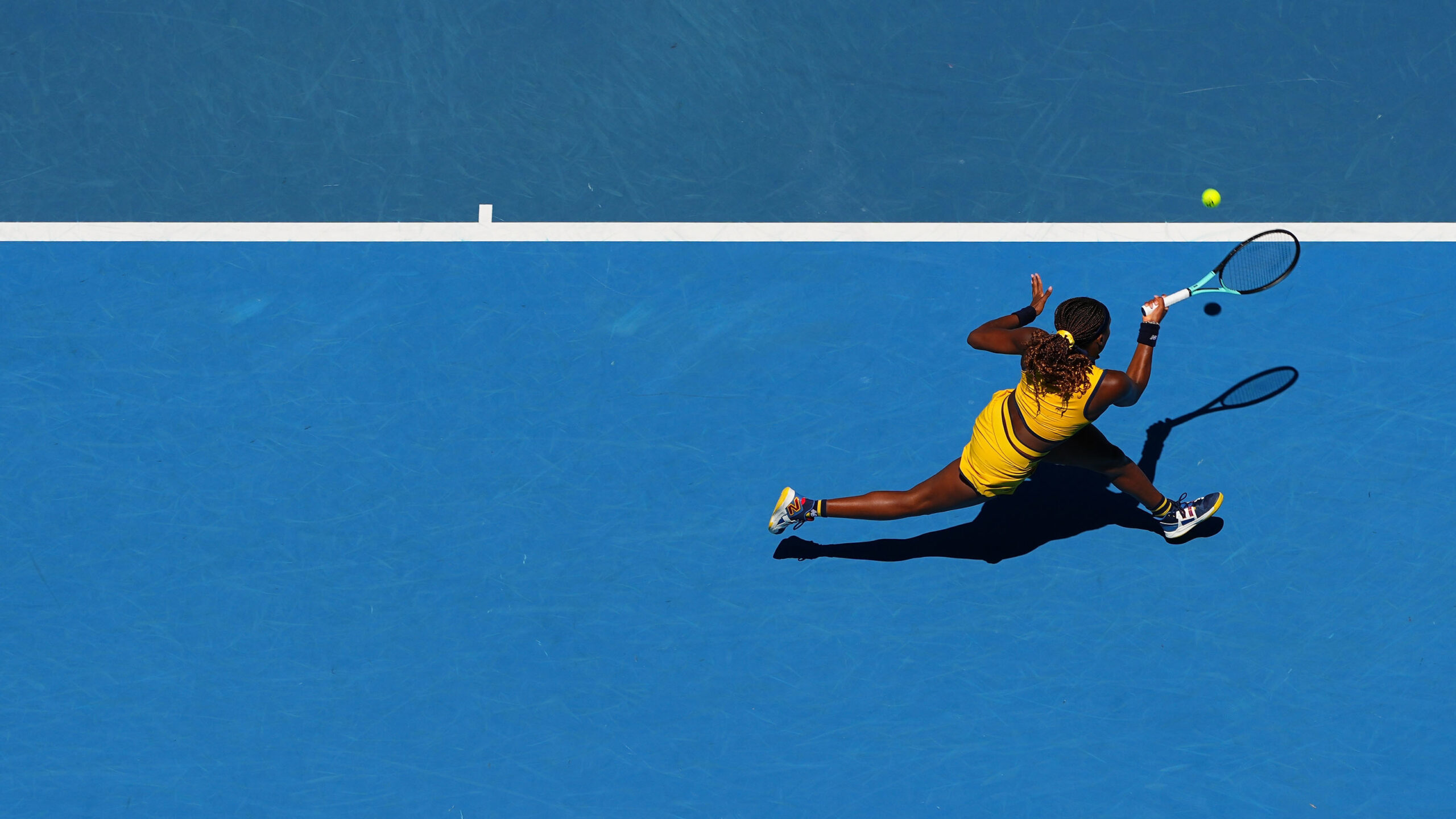Overhead shot of female tennis player in action at the Australian Open.