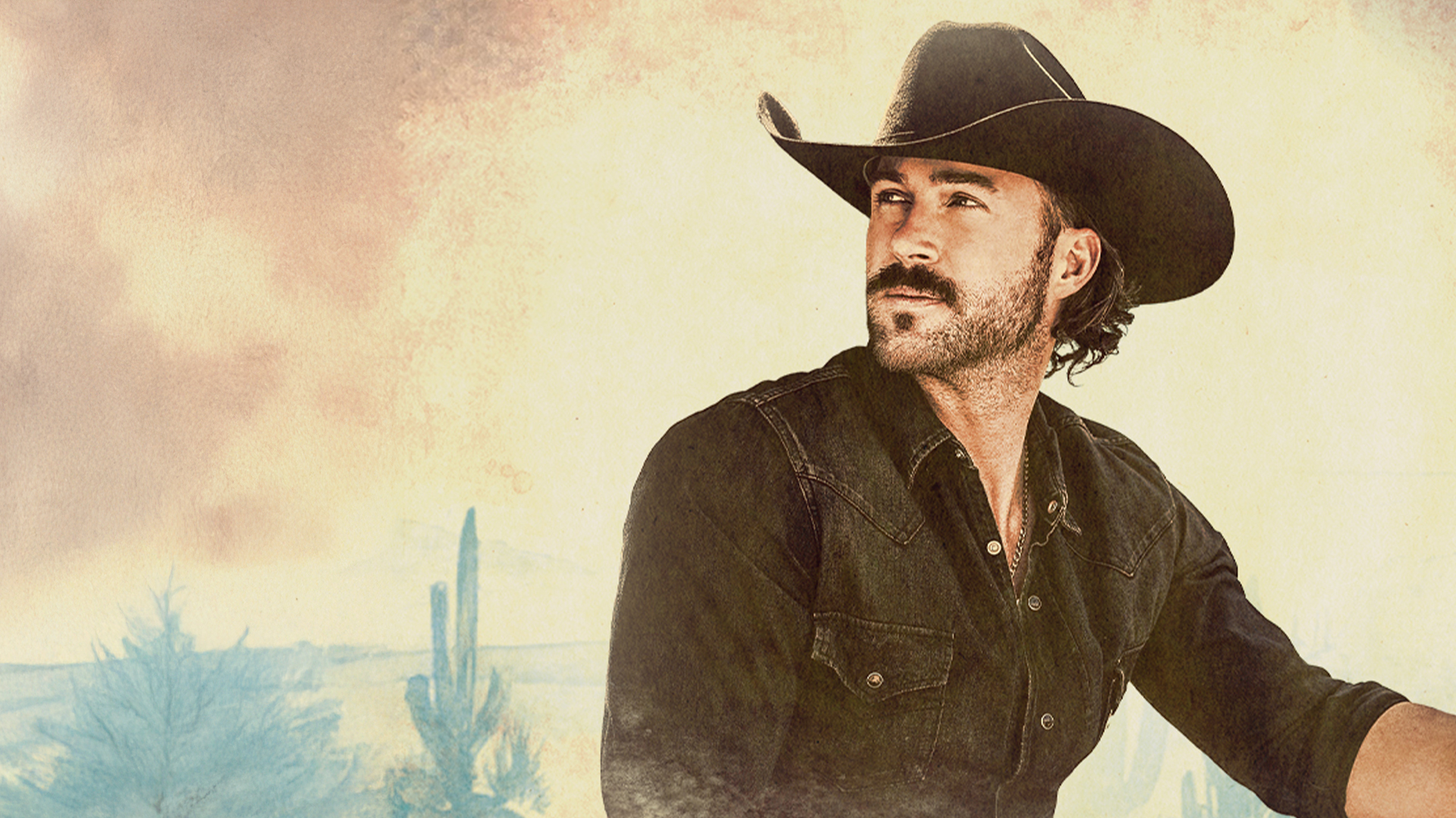 Singer Riley Green wearing a cowboy hat, posing against a country background.