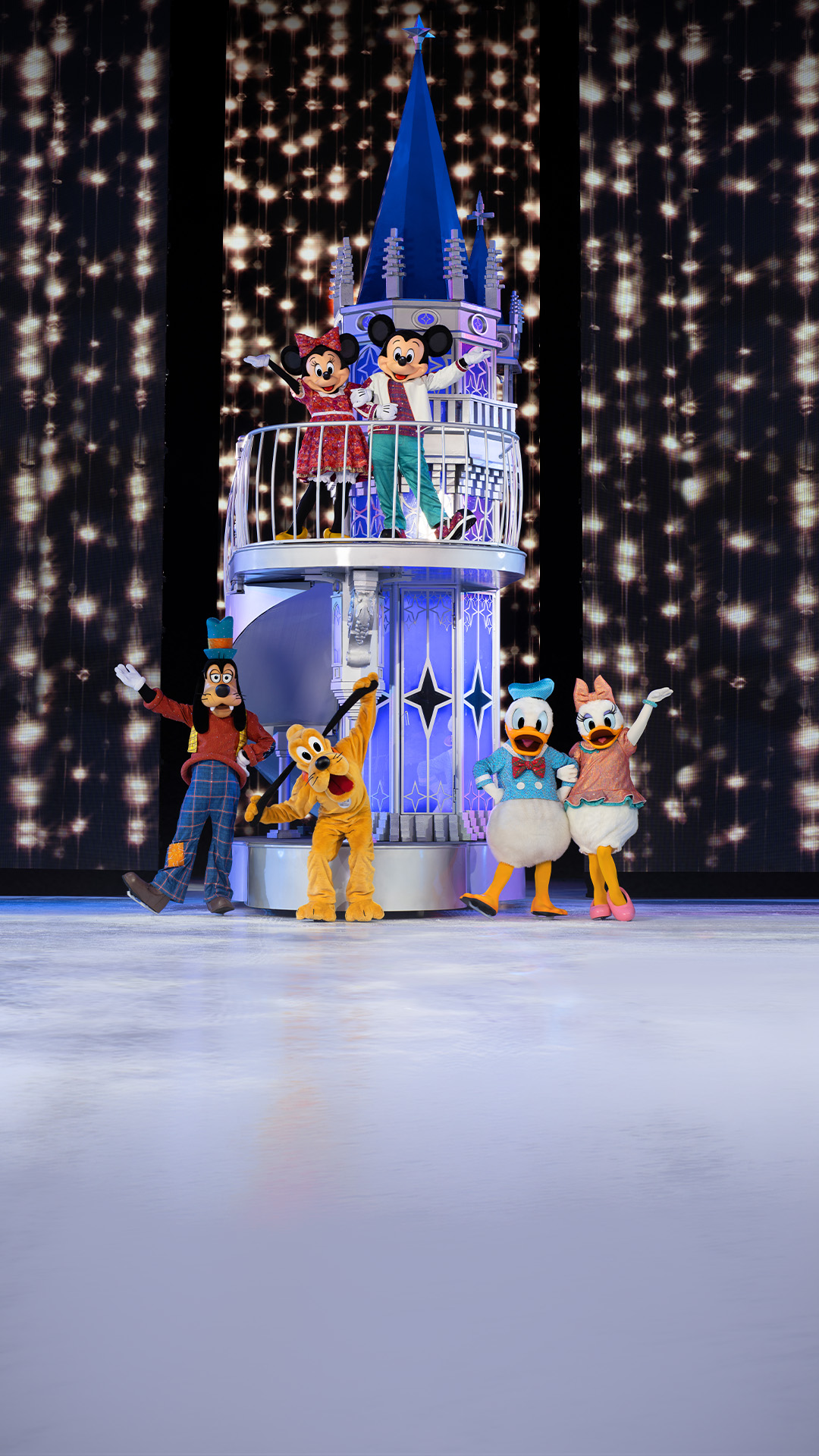 Disney on Ice performance titled "Magic in the Stars," with colourful characters skating under twinkling lights.